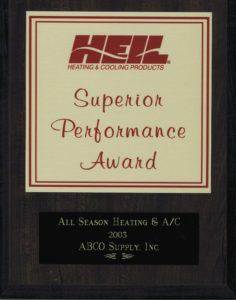 A plaque that says hel superior performance award.