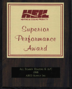 A wooden plaque with the words superion performance award.