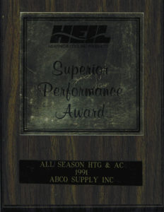 A wooden plaque with the words all season htc ac and abo supply inc.